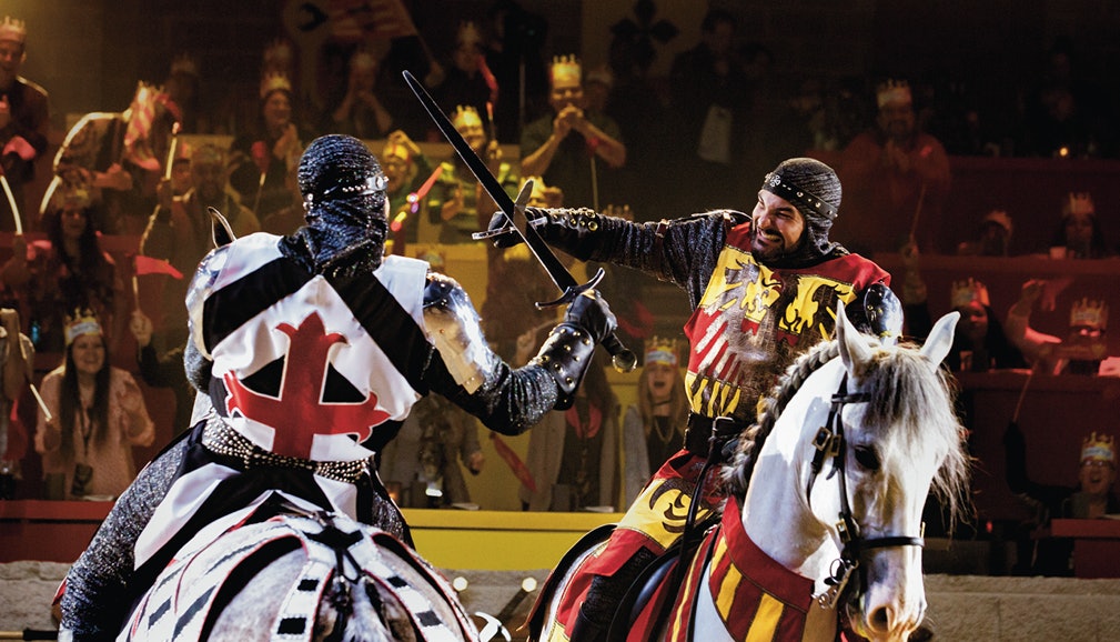 Two knights on horseback clash swords in a dramatic bid for power.